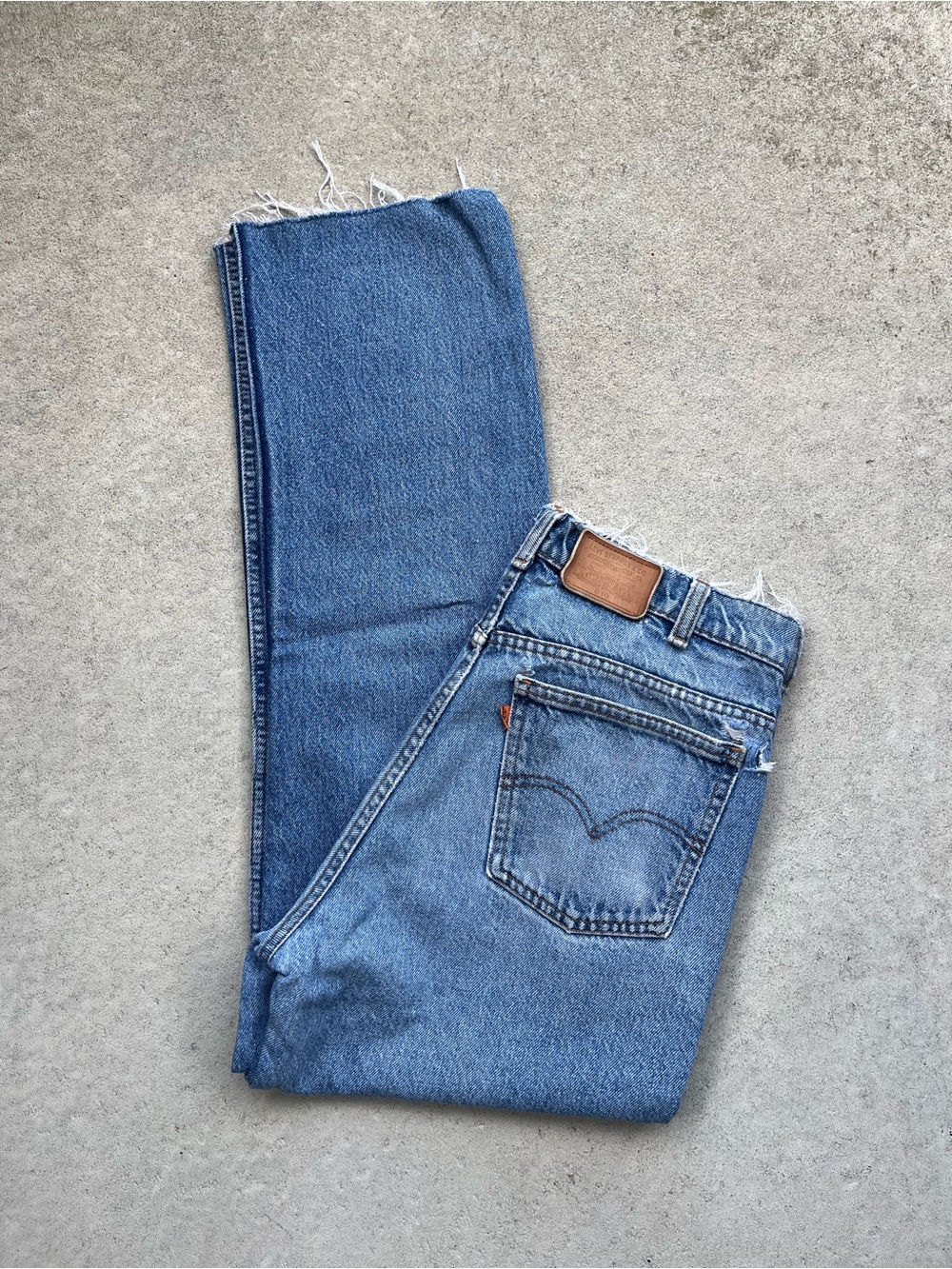Vintage Levi's Men's Medium Blue Straight Jeans with Leather Patch